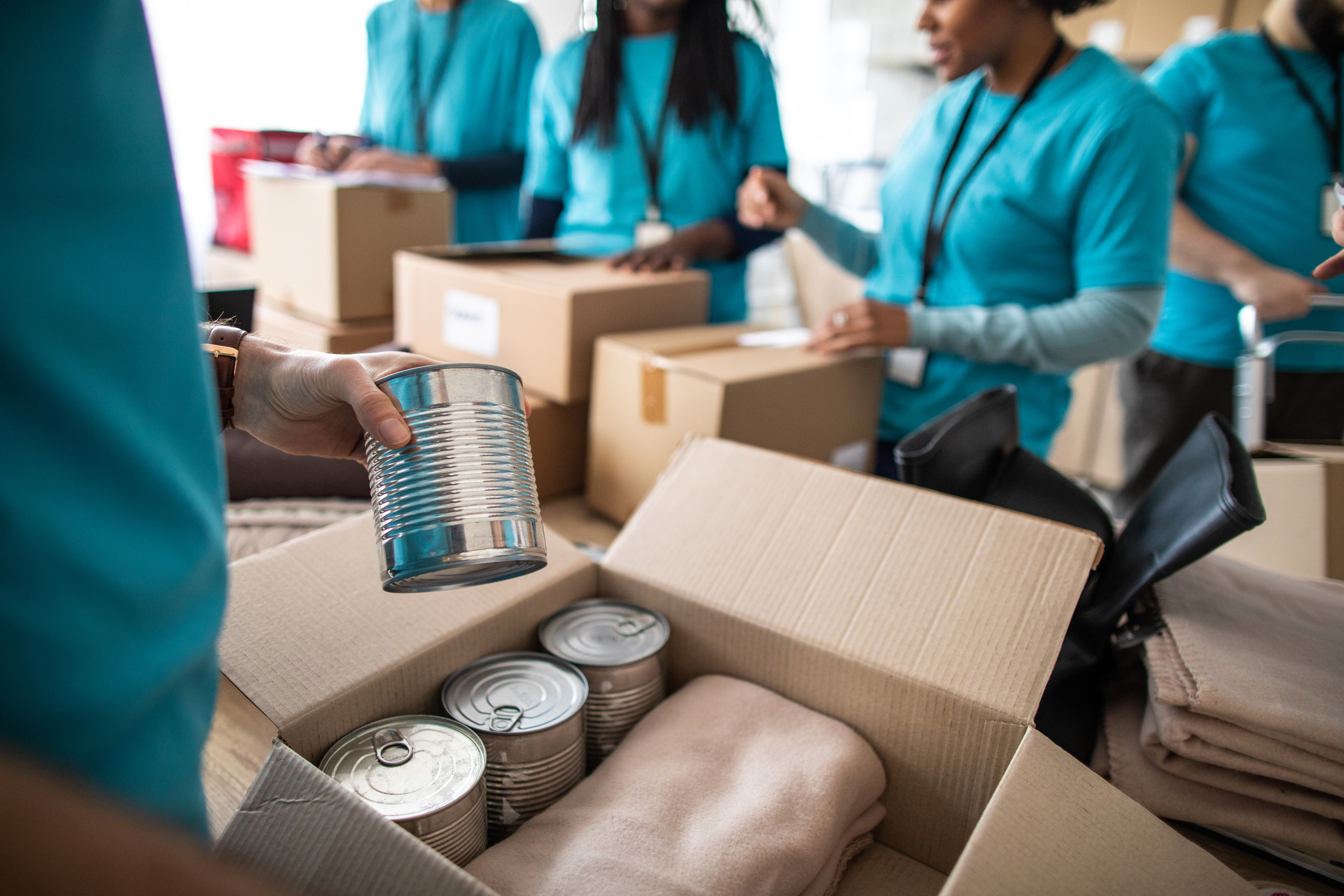 Volunteers packing humanitarian aid